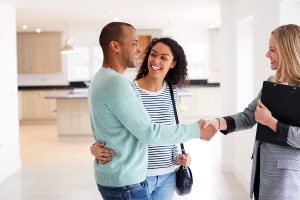 A property manager shaking hands with a renter