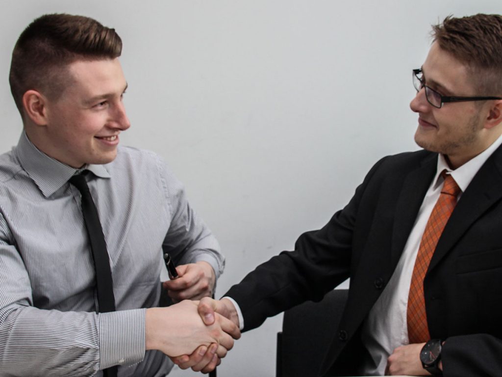 real estate agents shaking hands