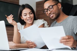 Couple applying to get pre-approved for a Mortgage